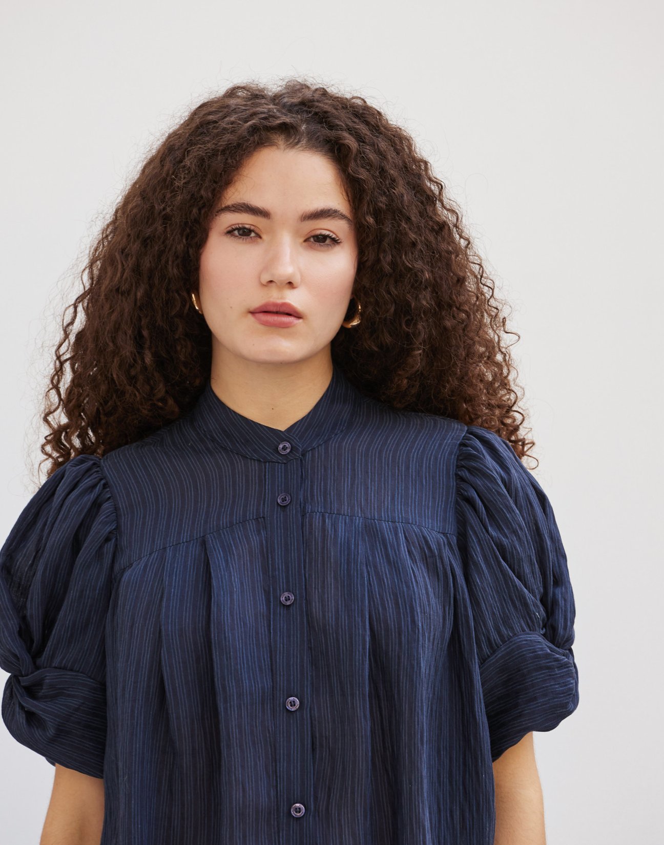 Striped shirt with knot