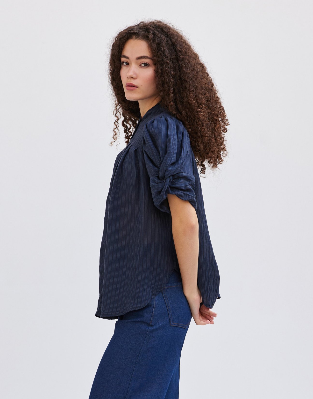 Striped shirt with knot