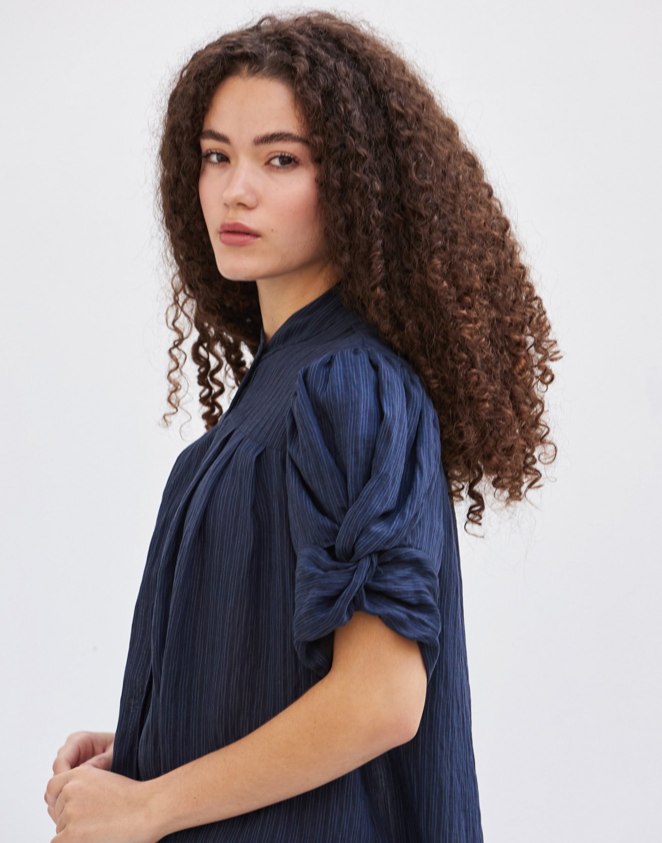 Striped shirt with knot