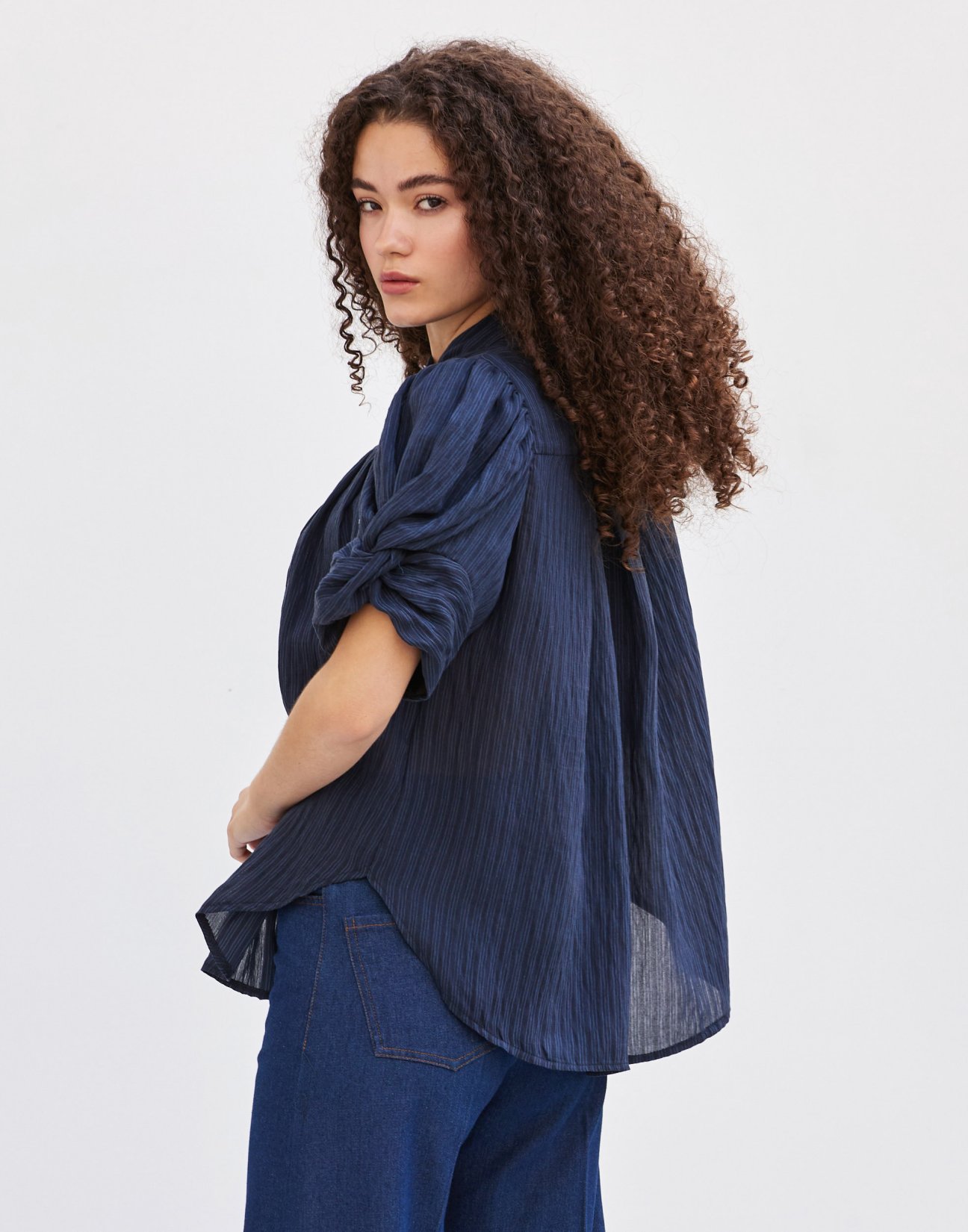 Striped shirt with knot