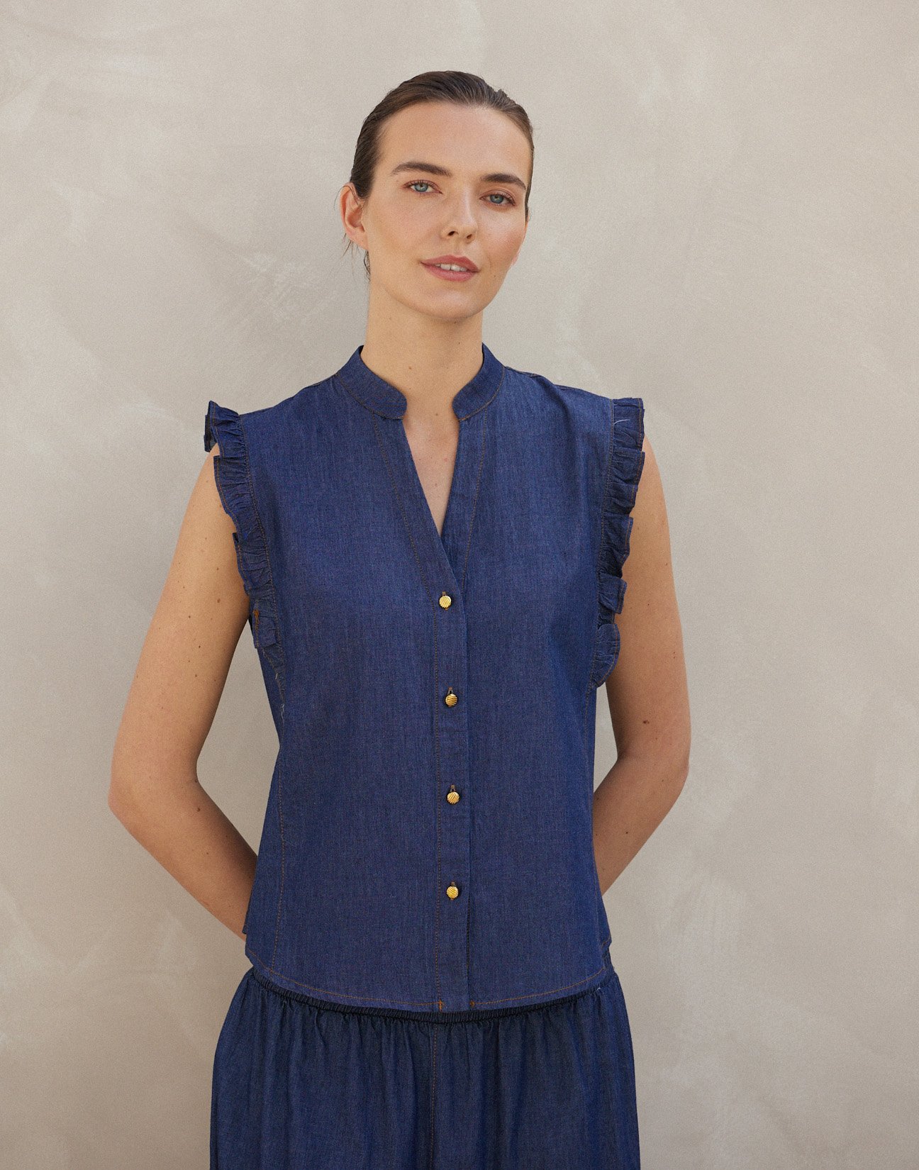 Denim shirt with ruffles