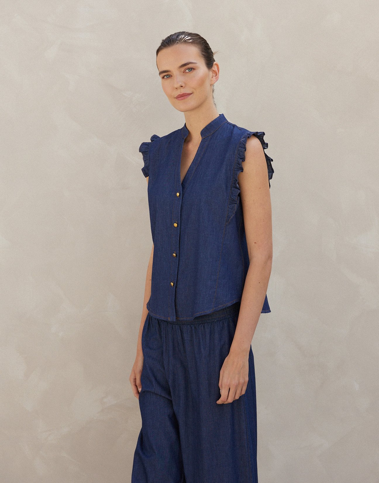 Denim shirt with ruffles