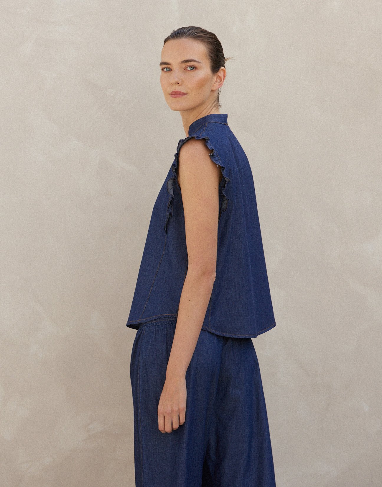 Denim shirt with ruffles