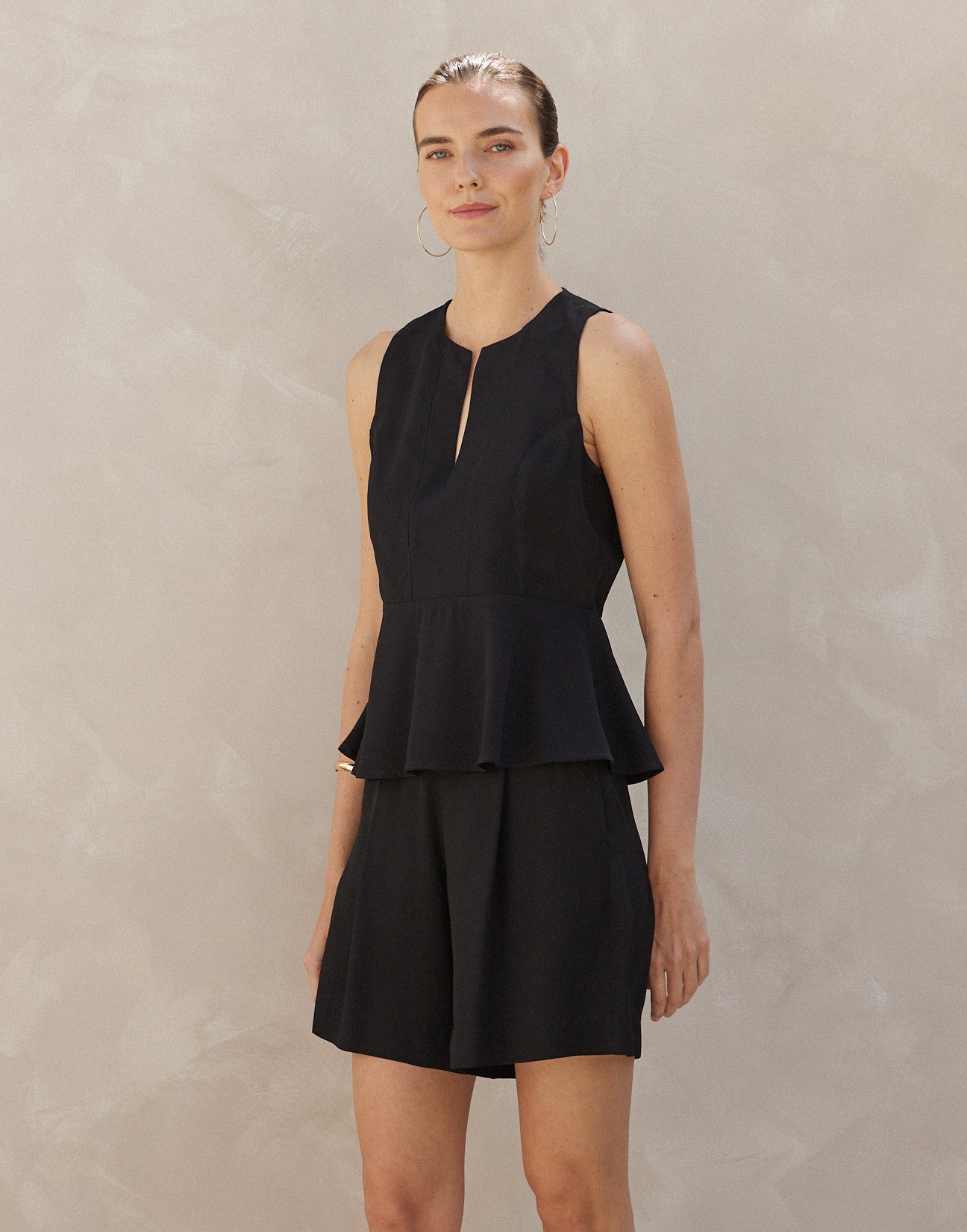 Sleeveless top with ruffles