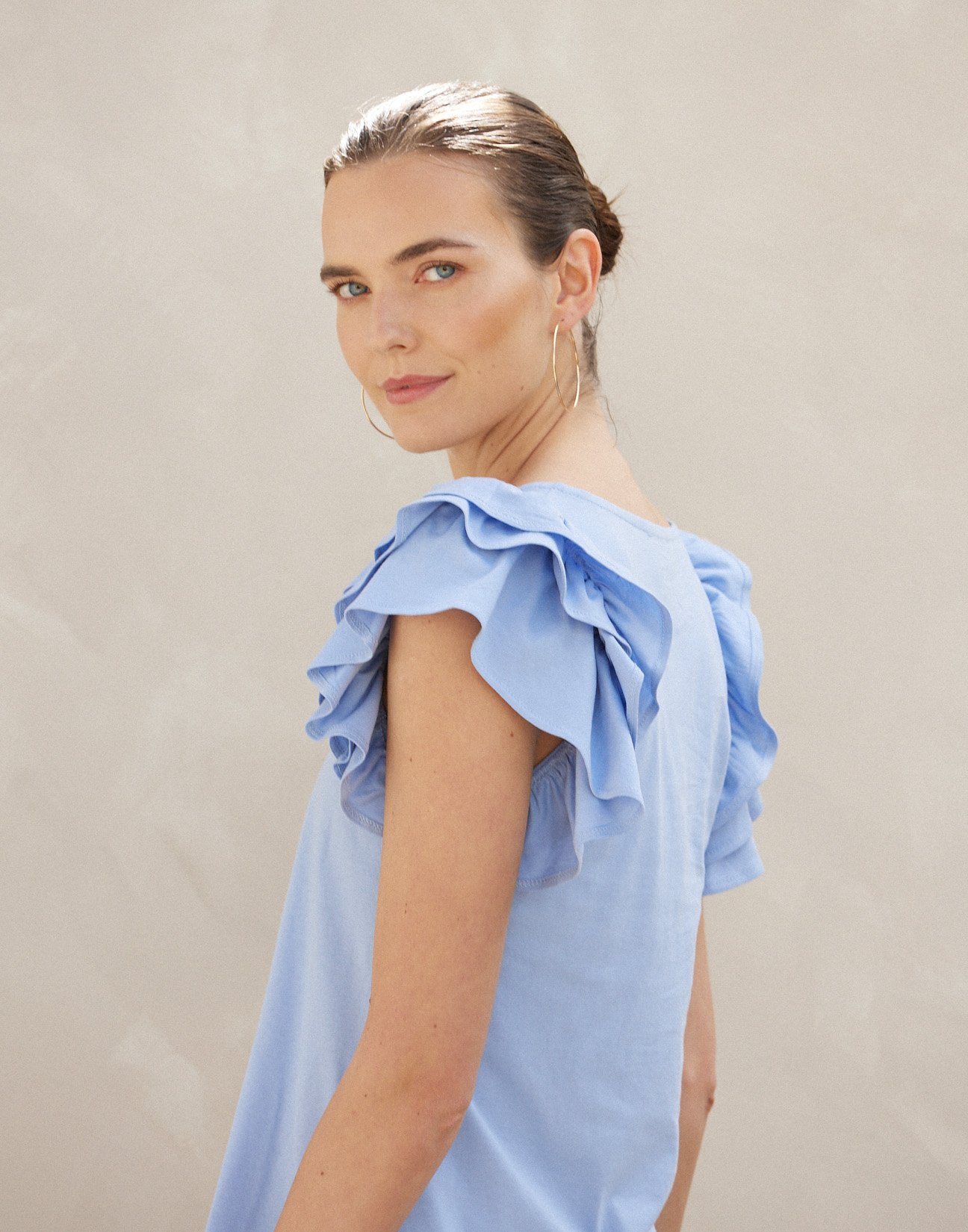 Blouse with double ruffles