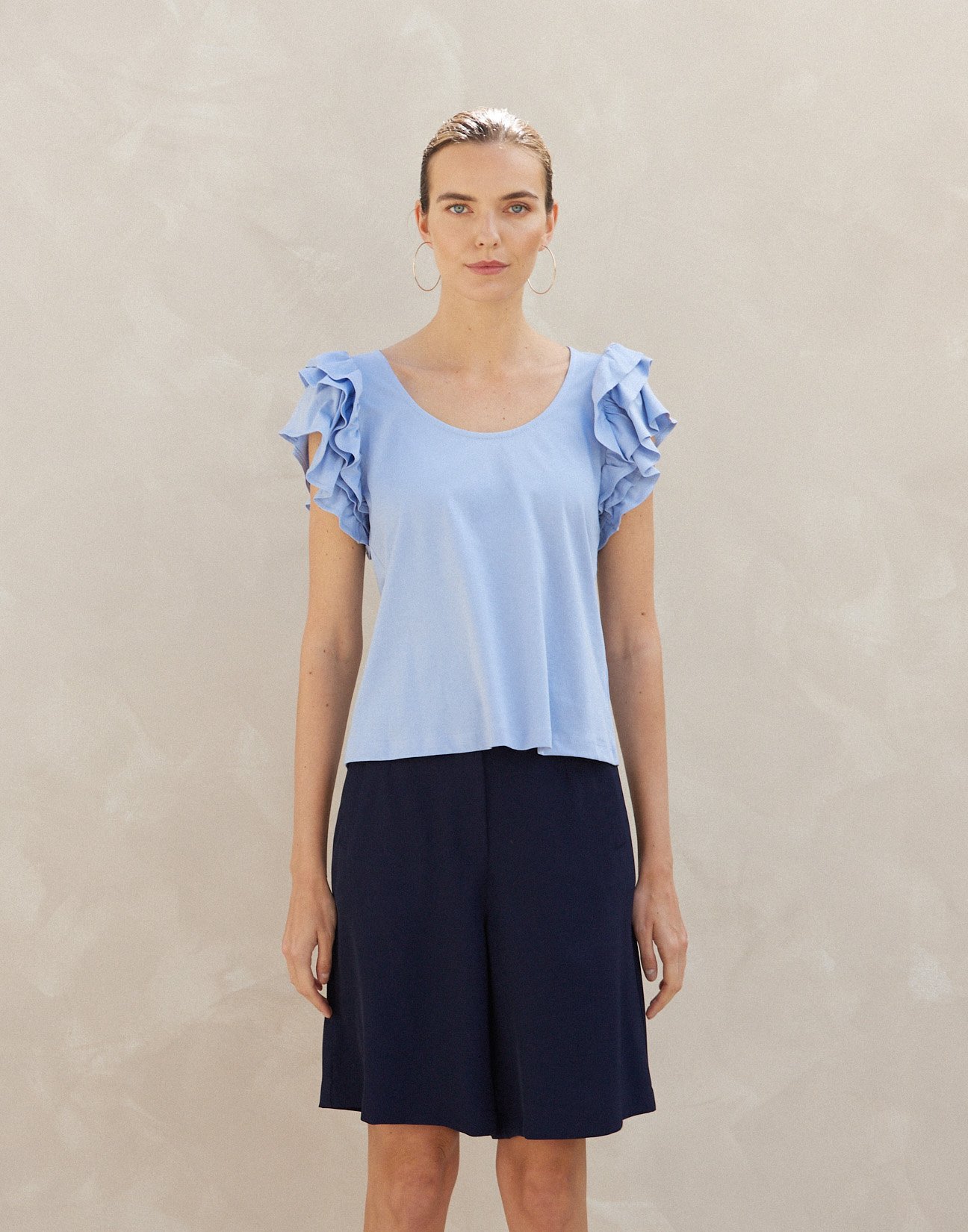 Blouse with double ruffles