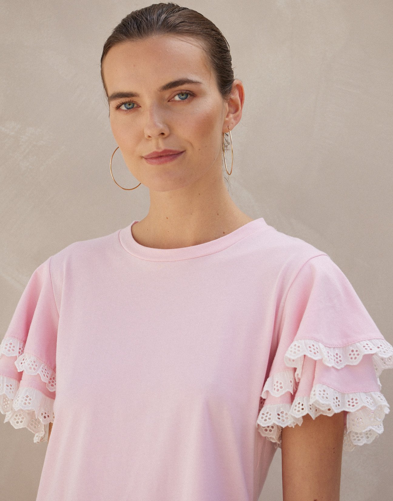 Ruffled blouse with embroidery detail