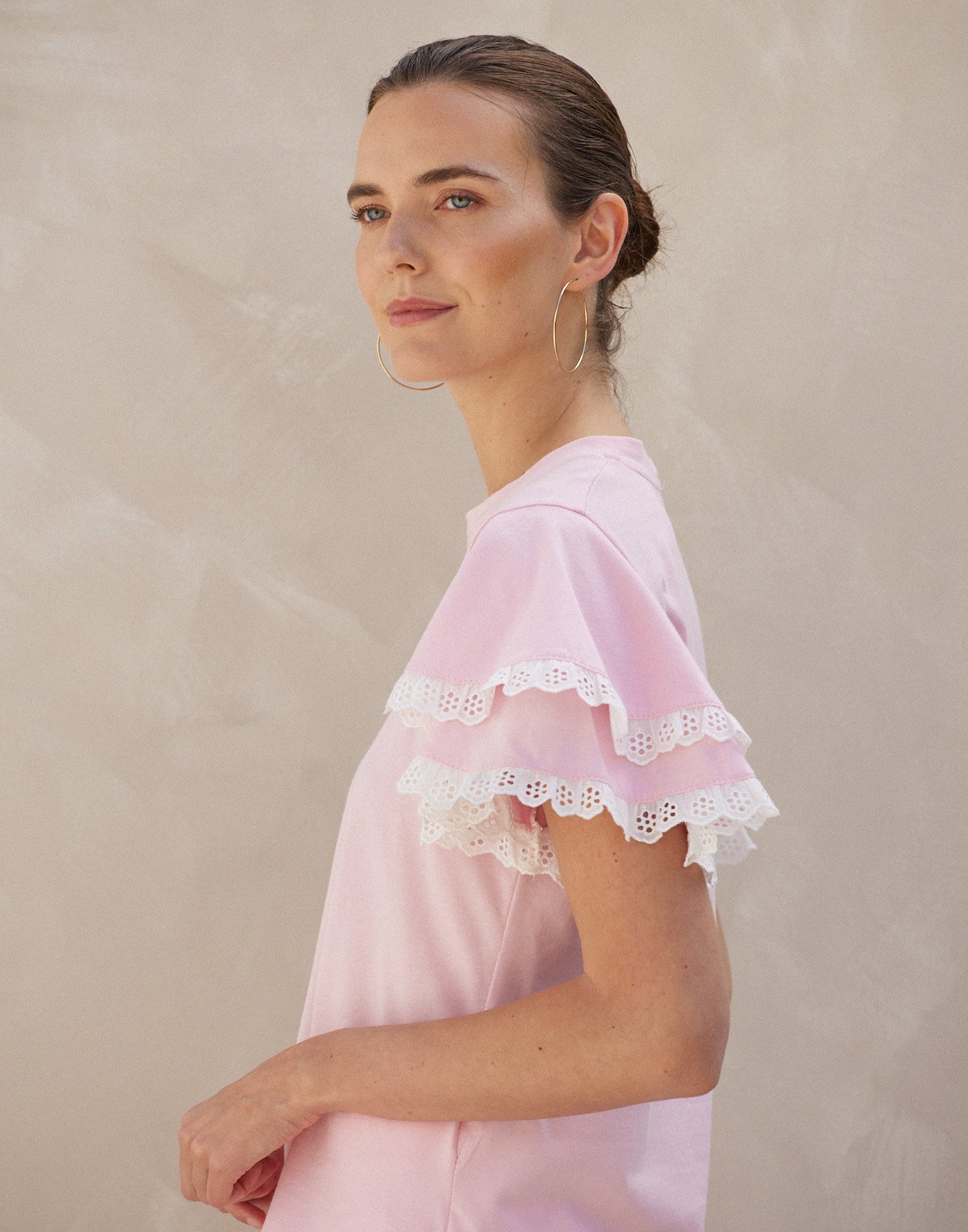 Ruffled blouse with embroidery detail