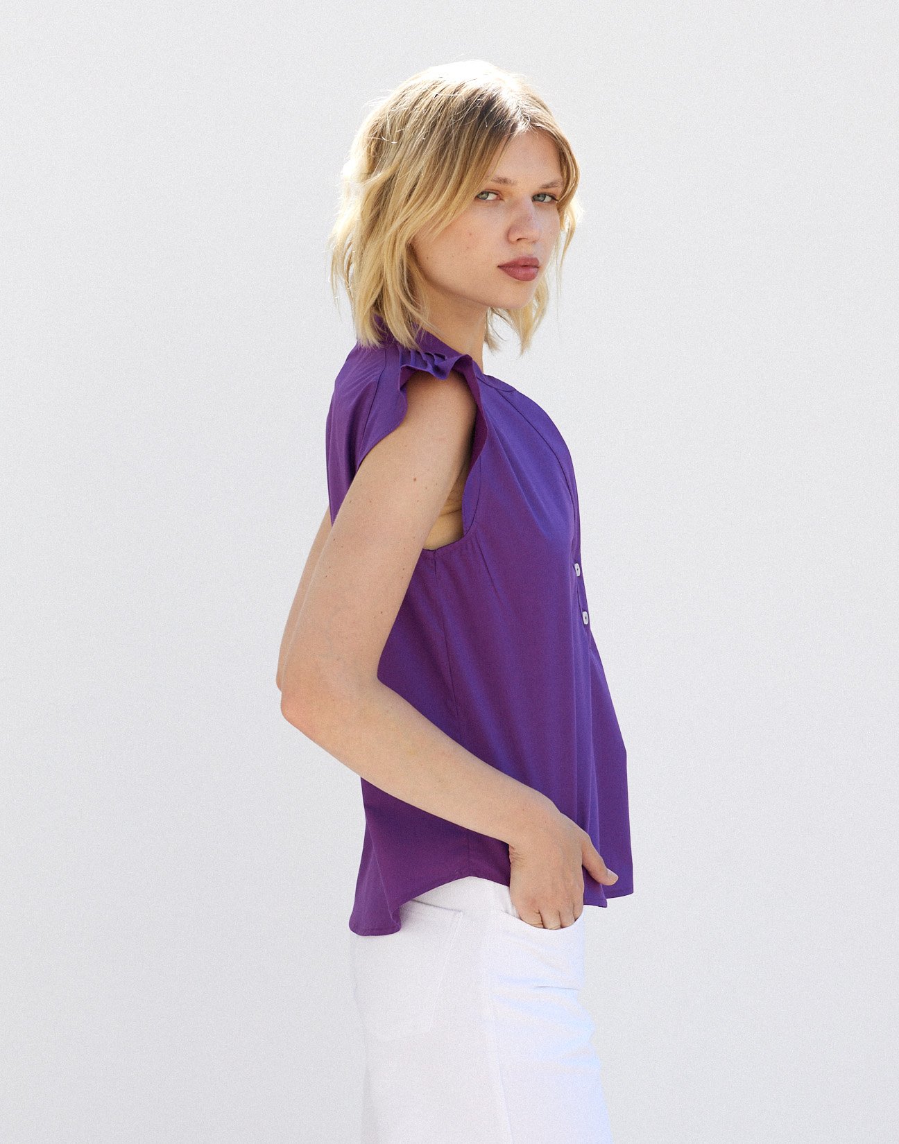 Blouse with pleats