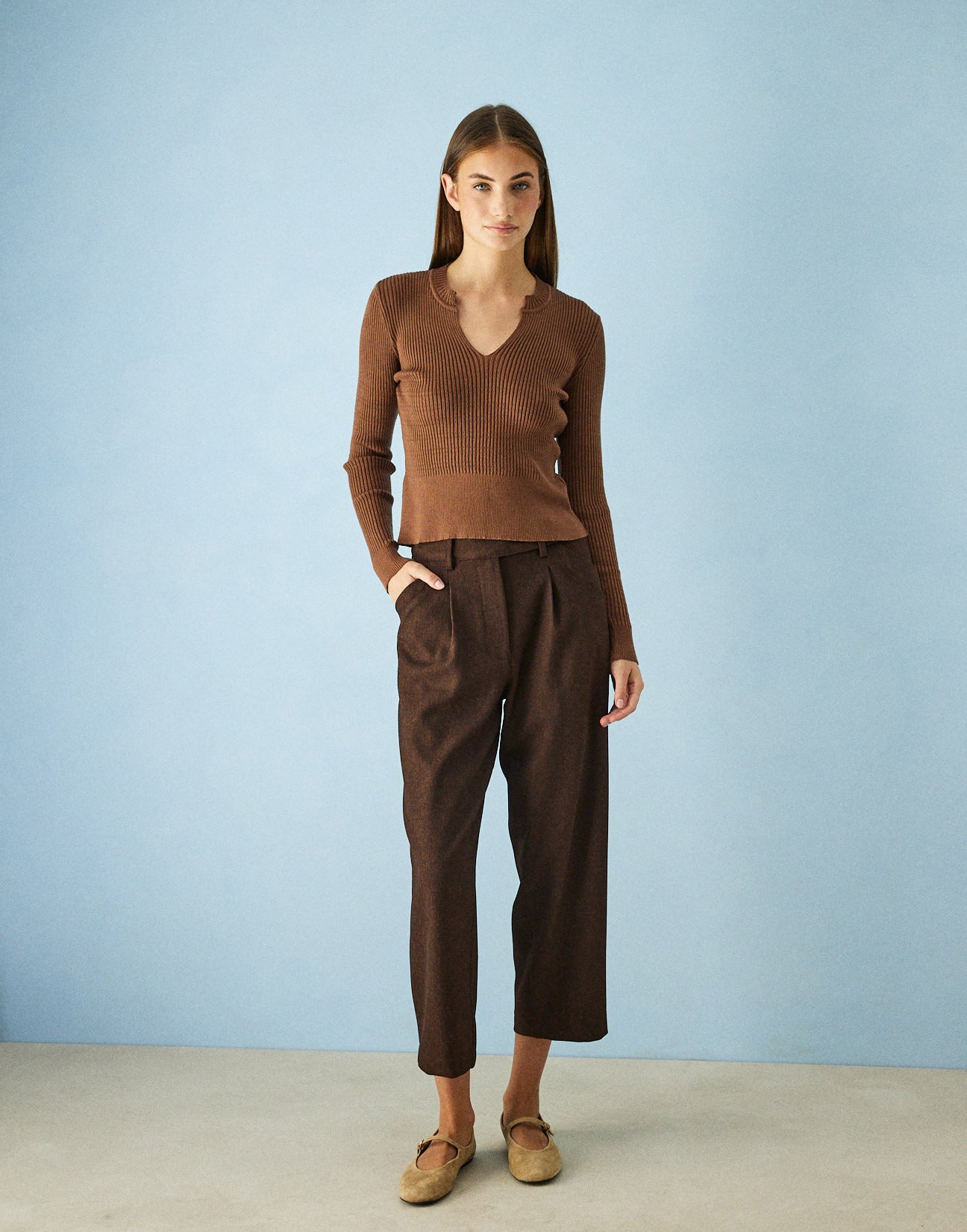 Trousers with slant pockets