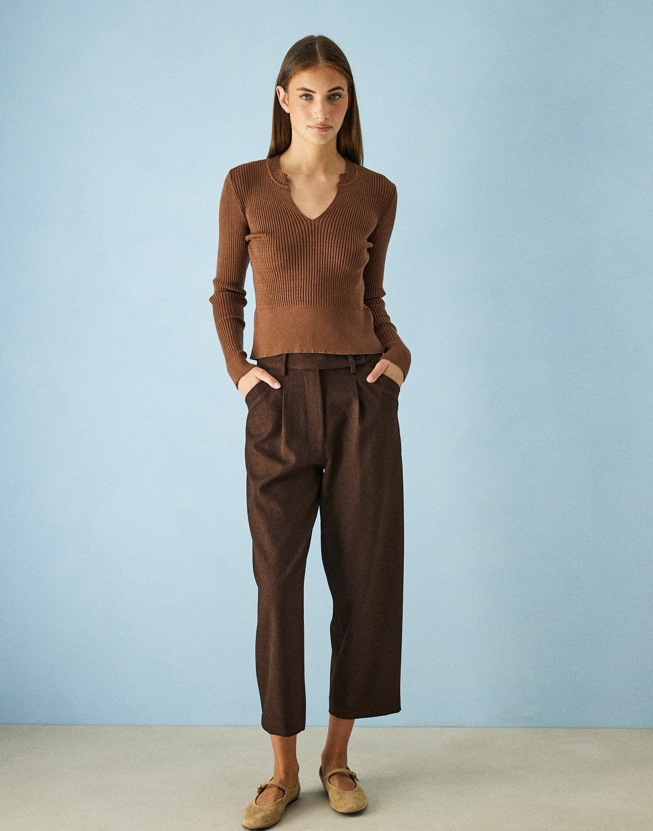 Trousers with slant pockets