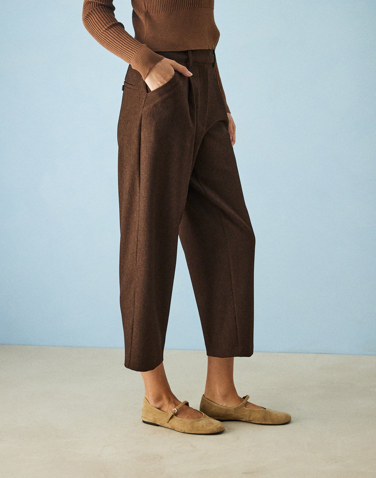 Trousers with slant pockets