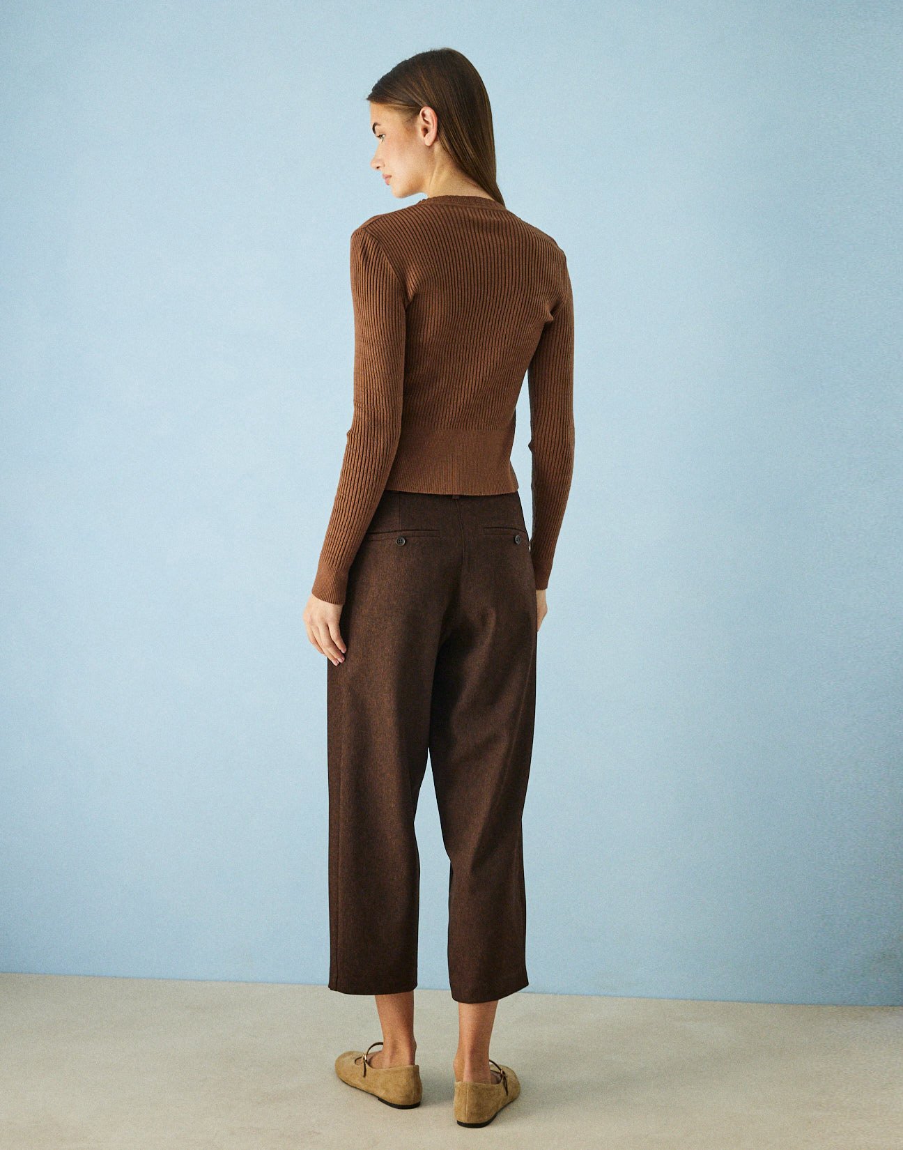 Trousers with slant pockets