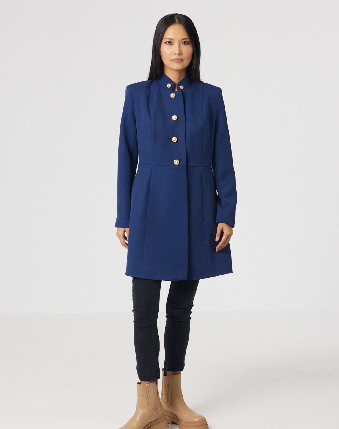 Coat with jewel buttons