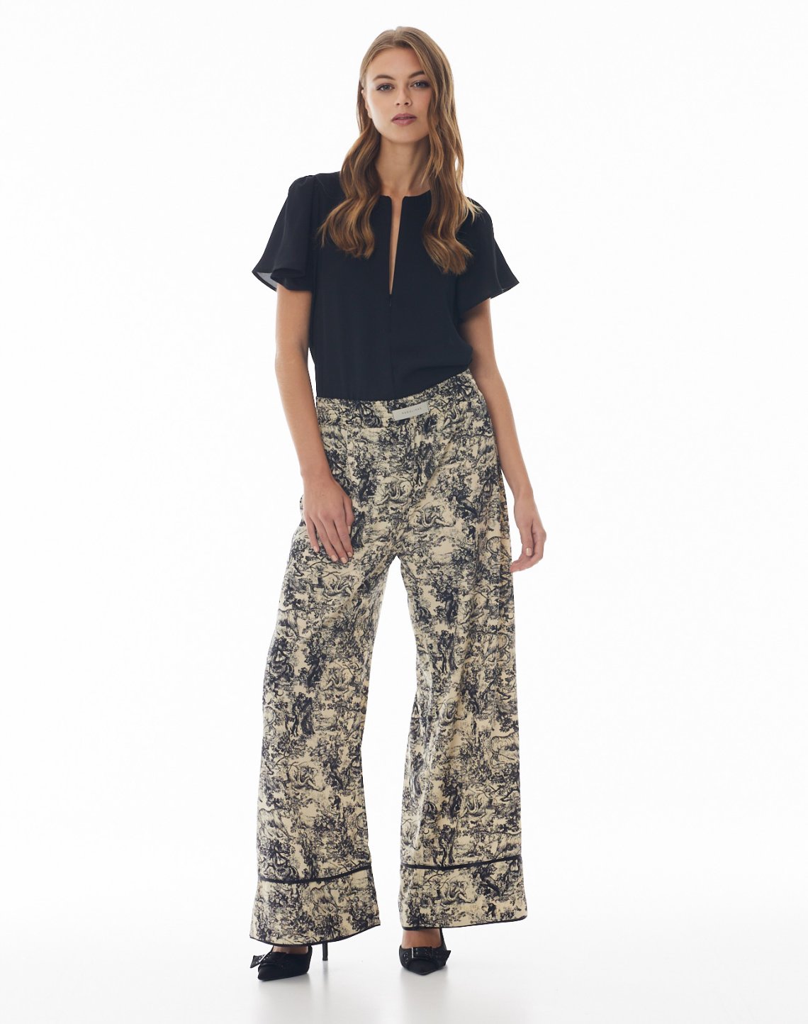 Printed trousers with piping