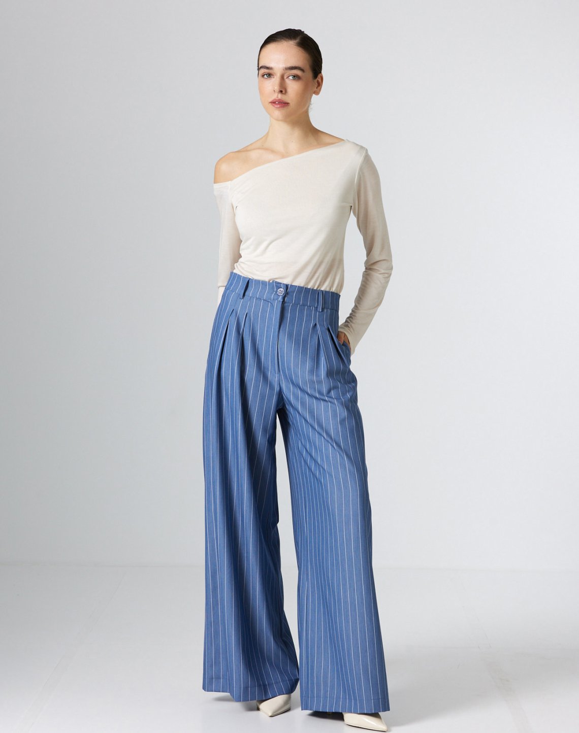 Pinstripe trousers with pleats