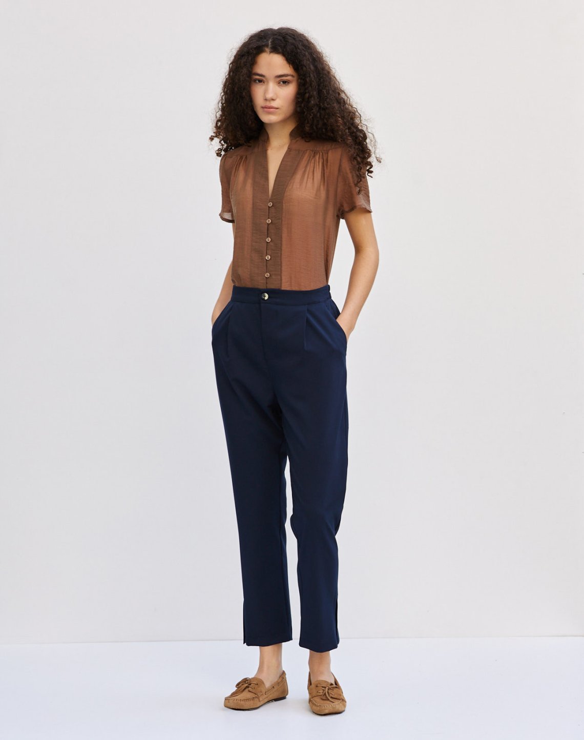 Trousers with slits