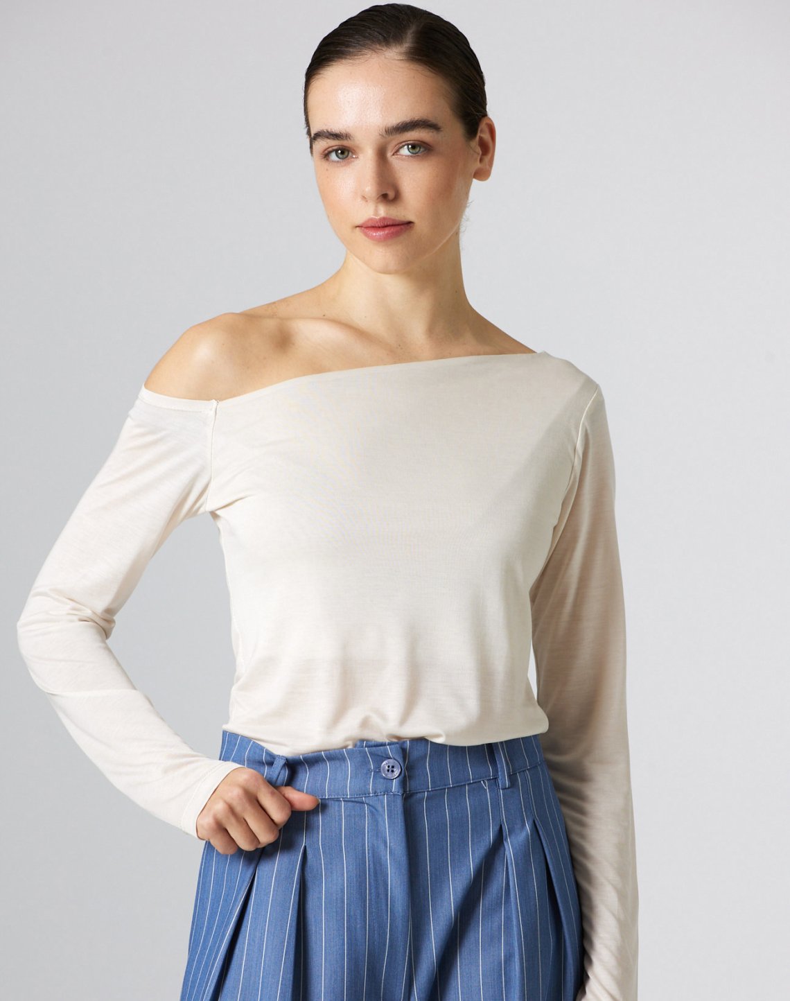 Top with asymmetric neckline