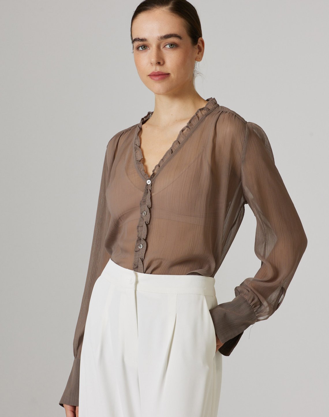 Semi sheer blouse with ruffles
