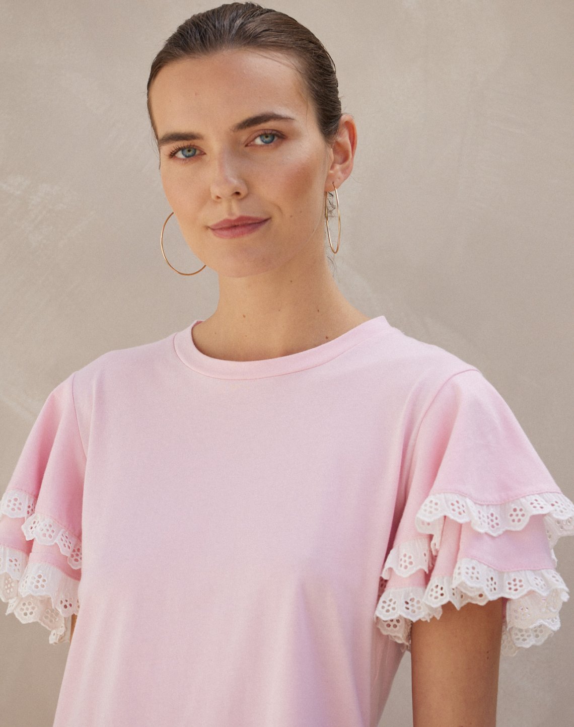 Ruffled blouse with embroidery detail