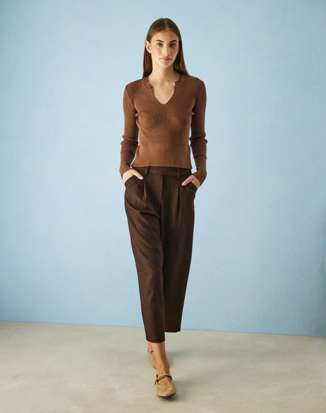 Trousers with slant pockets
